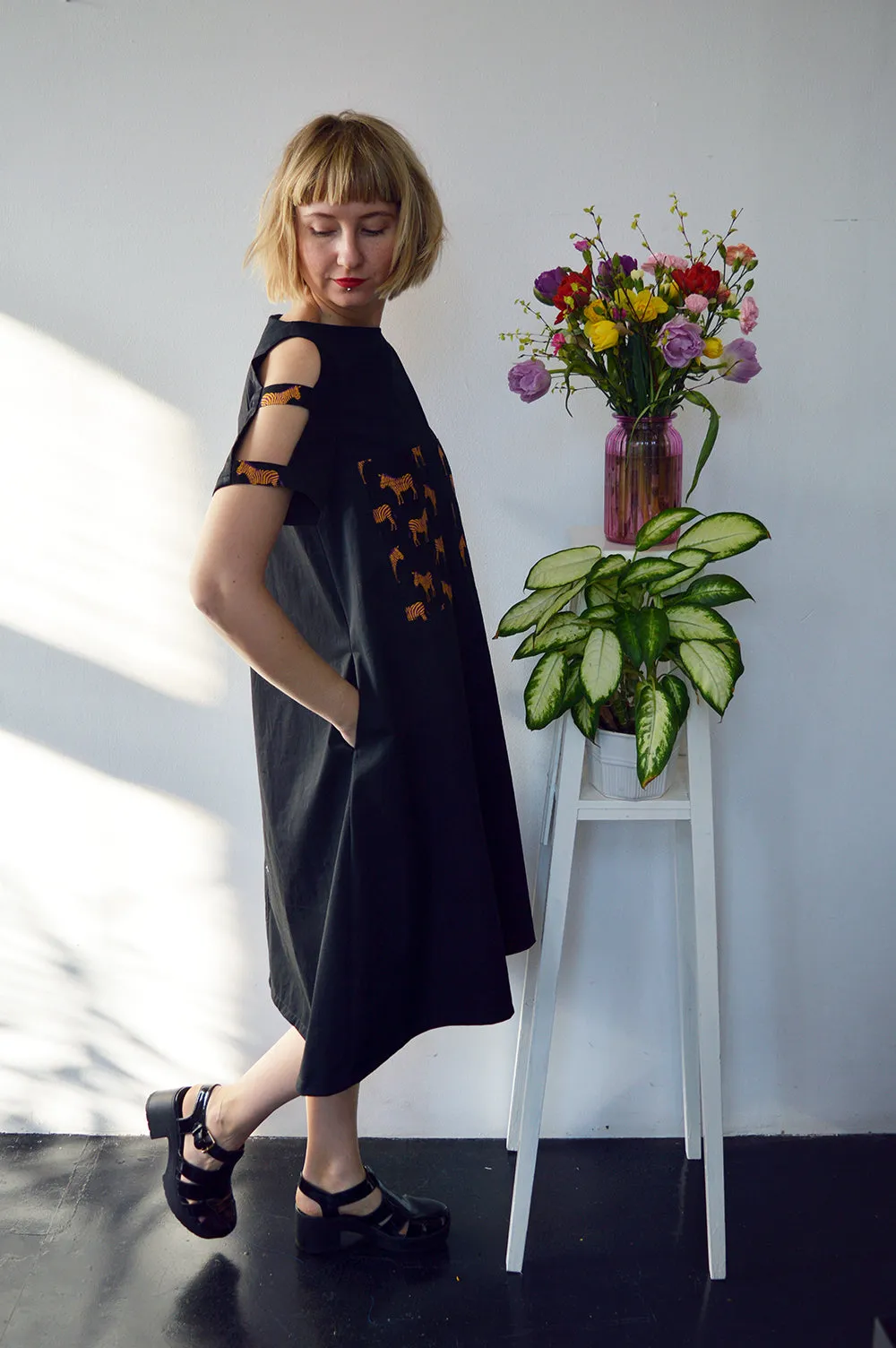 Fresh and New Spring Summer 2018 Black Cotton Dress with Contrast Pockets and Naked Shoulder Detail.